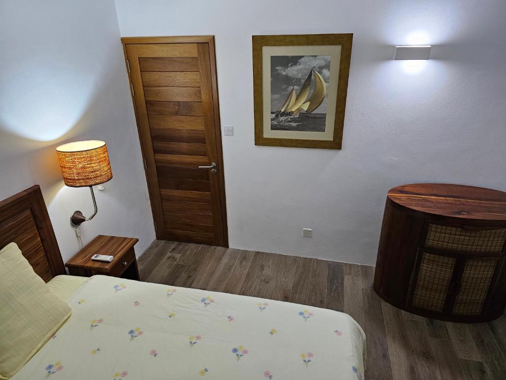 Postel nebo postele na pokoji v ubytování Villa Trochetia