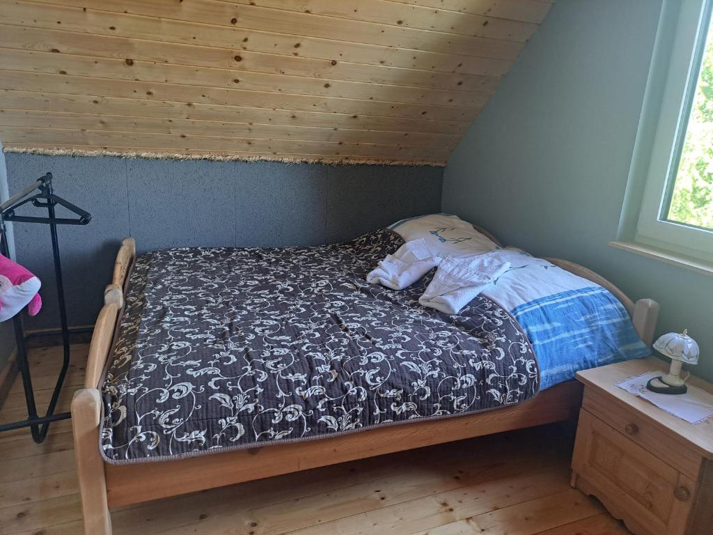 Postel nebo postele na pokoji v ubytování Świerkowy Zakątek u Bacy