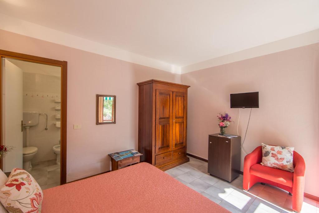Postel nebo postele na pokoji v ubytování Hotel La Feluca
