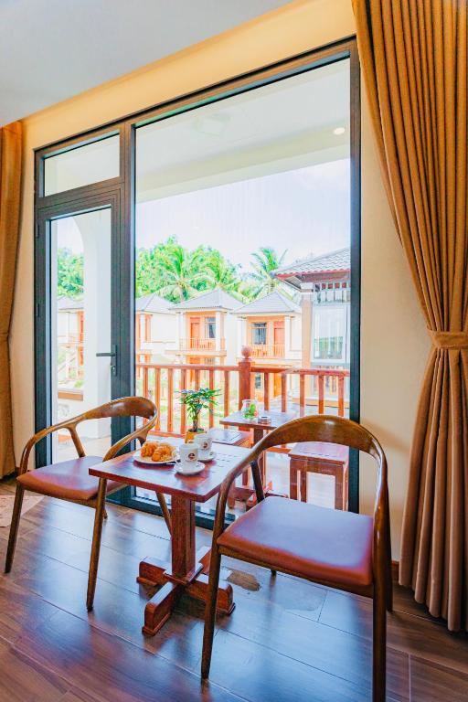 Balkón nebo terasa v ubytování Palm Bay Resort Phu Quoc