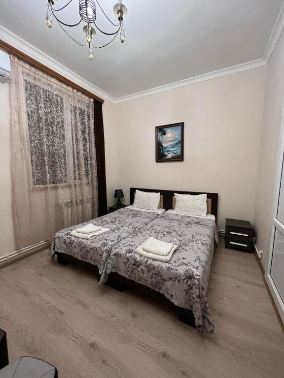 Postel nebo postele na pokoji v ubytování Arm Hotel