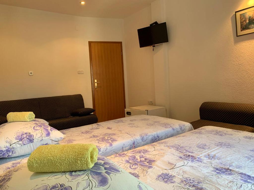 Postel nebo postele na pokoji v ubytování Room Ivana