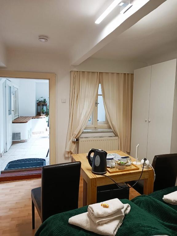 Postel nebo postele na pokoji v ubytování Cityhotel Junger Fuchs