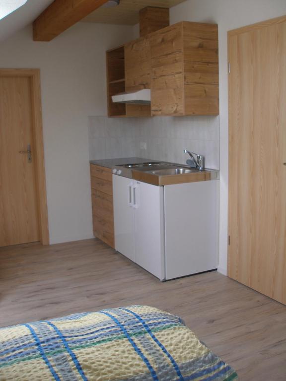 Kuchyň nebo kuchyňský kout v ubytování Gasthof Rössli