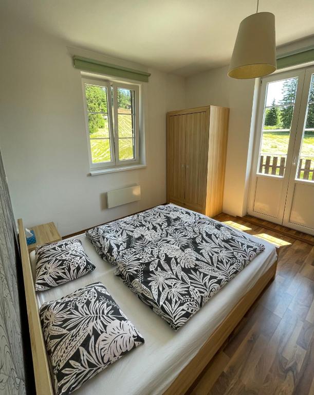 Postel nebo postele na pokoji v ubytování Apartman v Beskydech