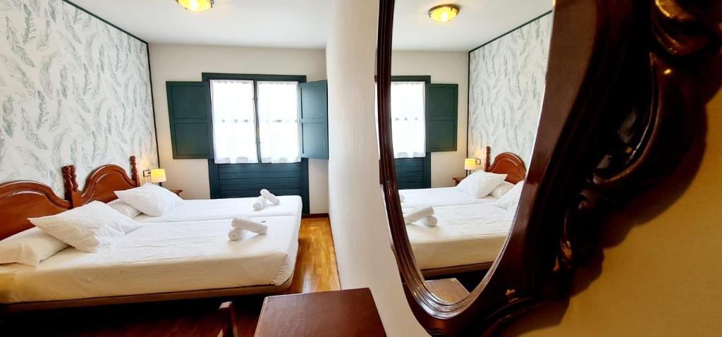 Postel nebo postele na pokoji v ubytování Casa de Aldea Las 7 gotas