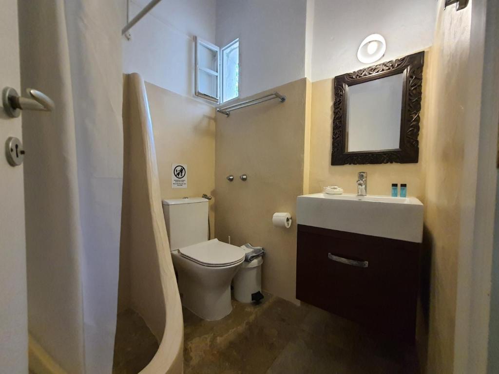 Koupelna v ubytování Vidalis Hotel