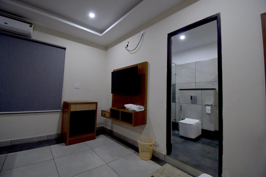 Koupelna v ubytování ARAKKAL GUESTHOUSE