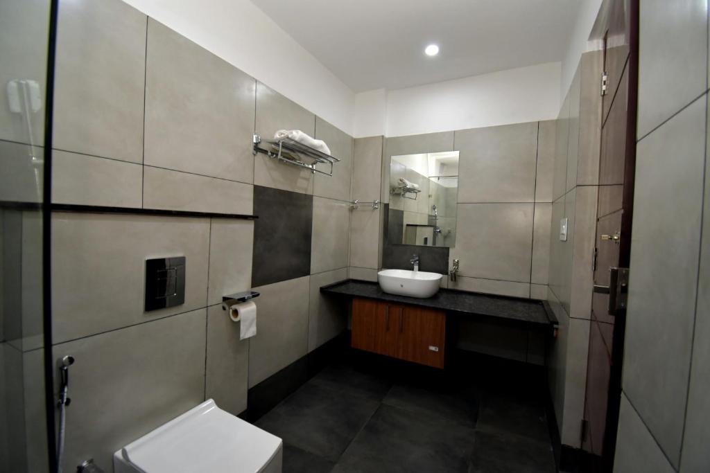 Koupelna v ubytování ARAKKAL GUESTHOUSE