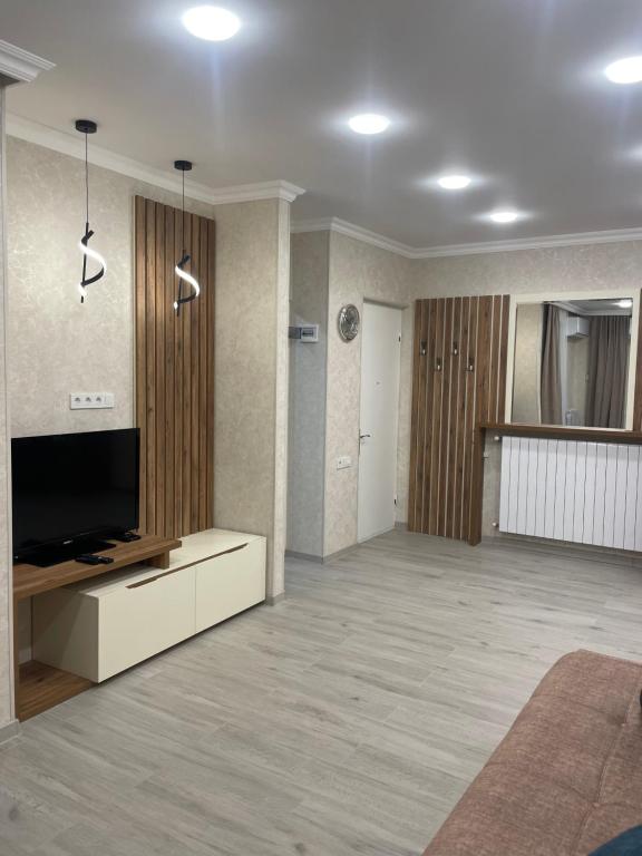 TV a/nebo společenská místnost v ubytování Sano's Home