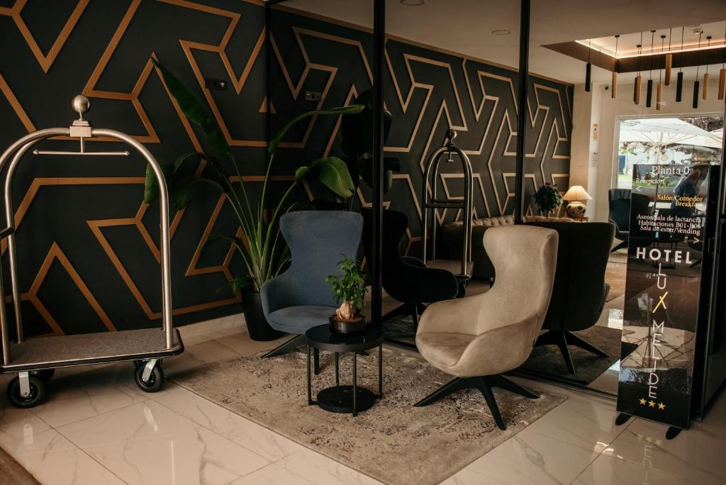 Гостиная зона в Hotel Lux Melide