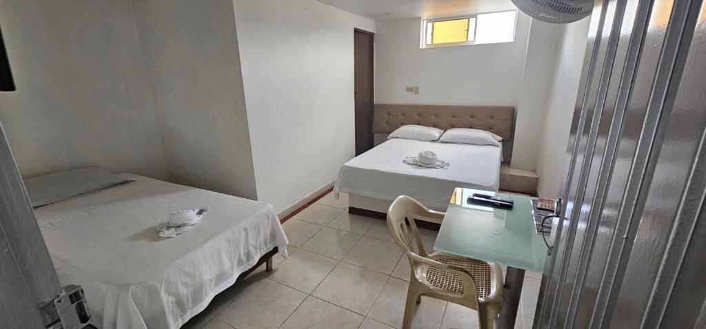 Postel nebo postele na pokoji v ubytování Hotel Bayadera Real