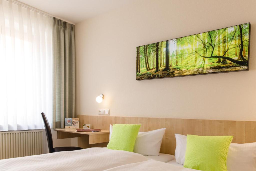 TV a/nebo společenská místnost v ubytování AKZENT Hotel Meerfräulein
