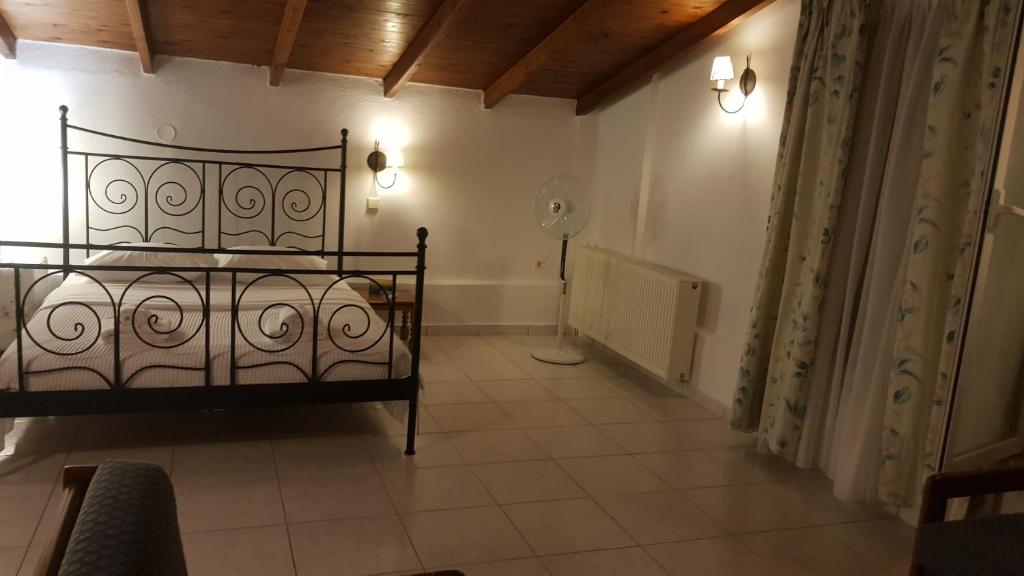 Postel nebo postele na pokoji v ubytování Villa Georgia Poseidi