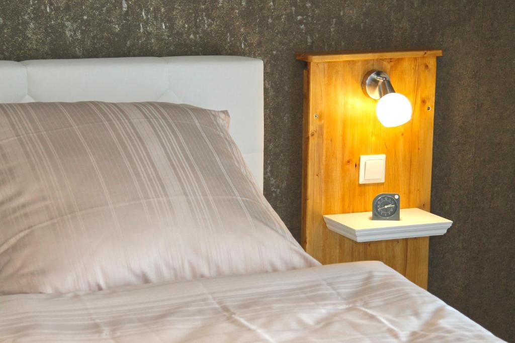 Postel nebo postele na pokoji v ubytování Basaltikum