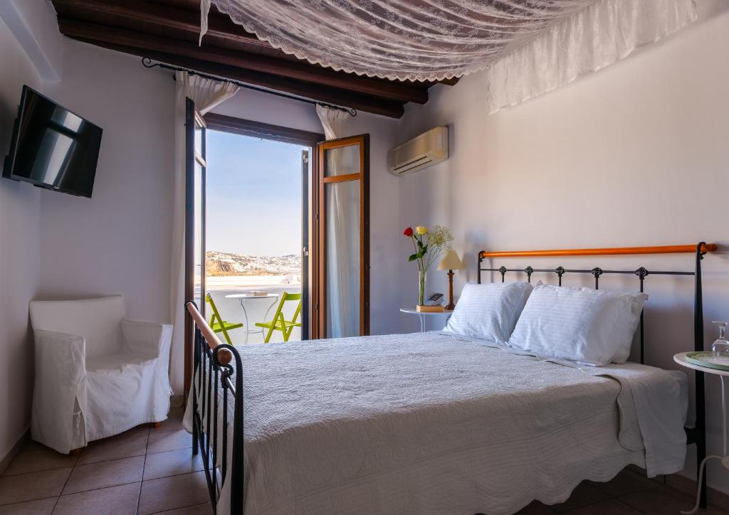 Postel nebo postele na pokoji v ubytování Paradision Hotel