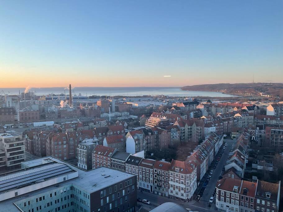 an aerial view of a city with buildings at Unik udsigt og beliggenhed in Aarhus