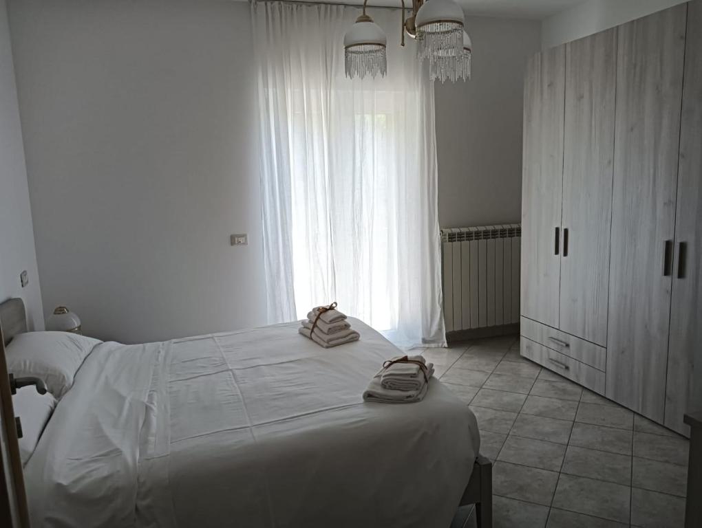Postel nebo postele na pokoji v ubytování CASA FRANCESCA