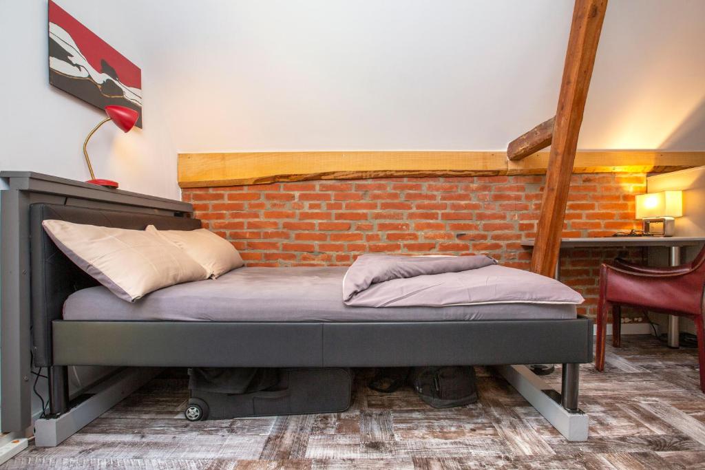 Postel nebo postele na pokoji v ubytování BnB Comfort Guesthouse Olten - Lostorf