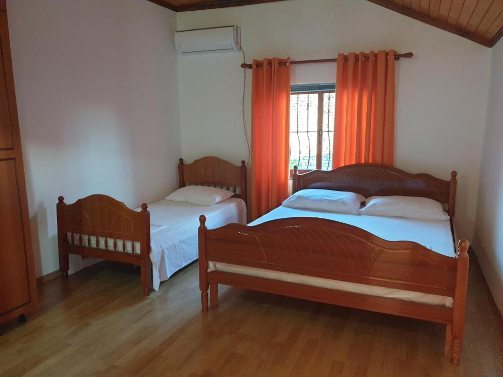 Postel nebo postele na pokoji v ubytování Eni's Villa