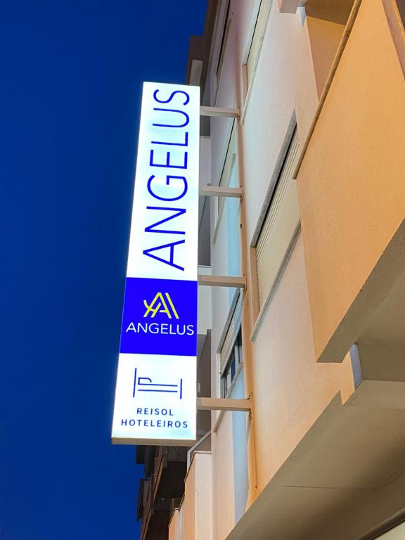a sign on the side of a building at Angelus in Fátima