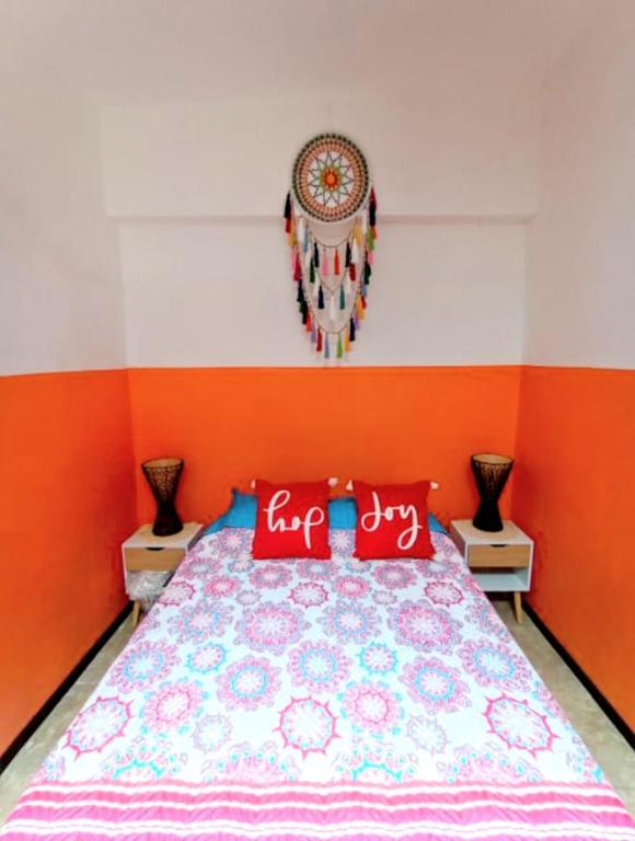 Postel nebo postele na pokoji v ubytování Nirvana Apartament Hostal
