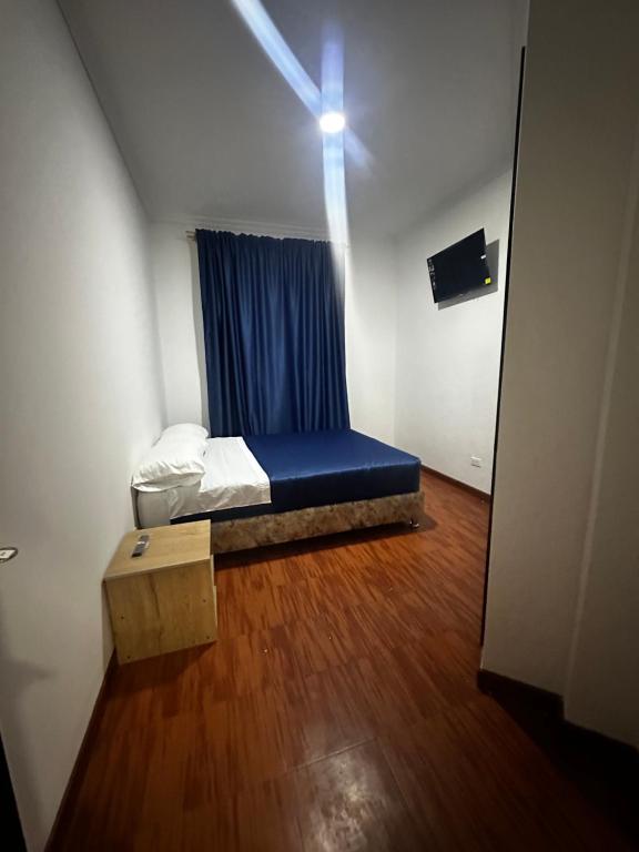 Postel nebo postele na pokoji v ubytování Hotel Artistico