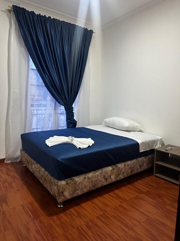 Postel nebo postele na pokoji v ubytování Hotel Artistico