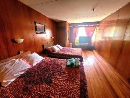 Postel nebo postele na pokoji v ubytování Eliodoro Yañez Casa o chalet