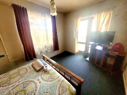 Postel nebo postele na pokoji v ubytování Eliodoro Yañez Casa o chalet