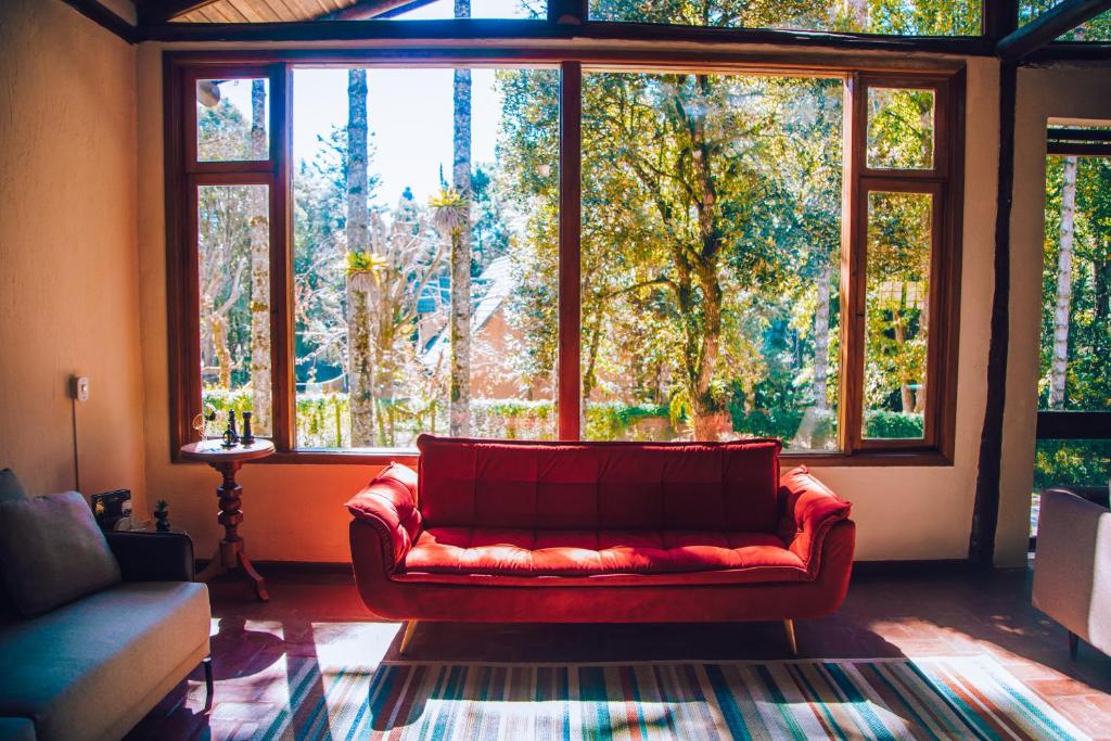 Uma área de estar em Pousada Villa Serena