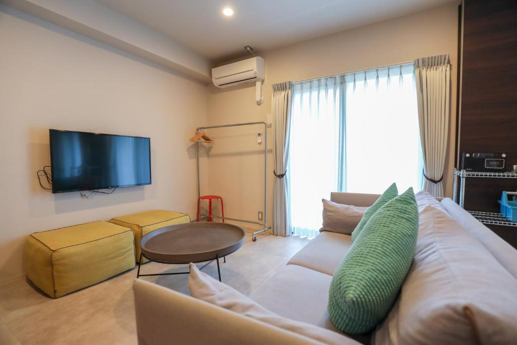 TV a/nebo společenská místnost v ubytování HOTEL so SUMIYOSHI