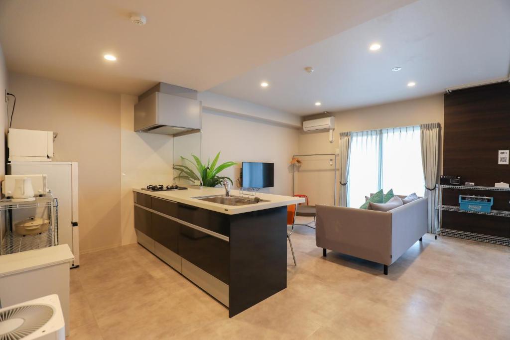 Kuchyň nebo kuchyňský kout v ubytování HOTEL so SUMIYOSHI