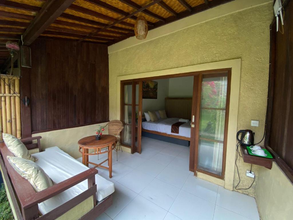 TV a/nebo společenská místnost v ubytování Pomelo Guest House