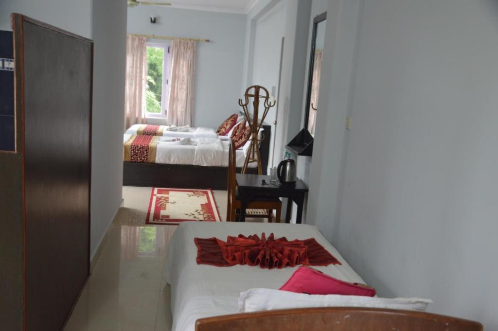 Letto o letti in una camera di Hotel Blue moon Pokhara