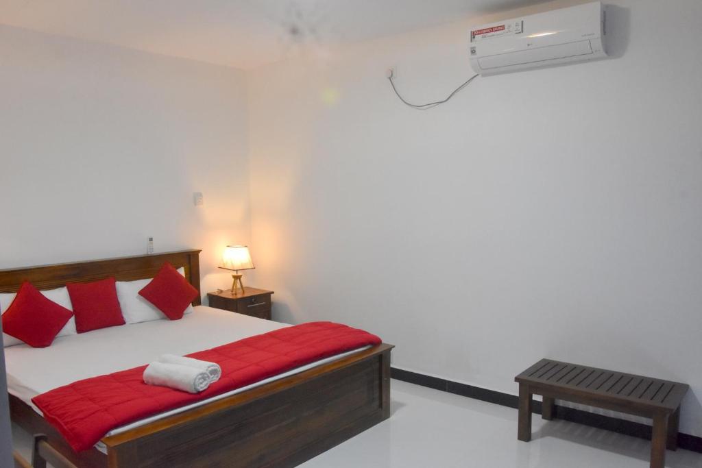 Postel nebo postele na pokoji v ubytování Cozy Homestay Kandy