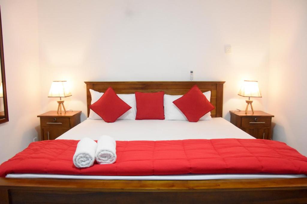 Postel nebo postele na pokoji v ubytování Cozy Homestay Kandy