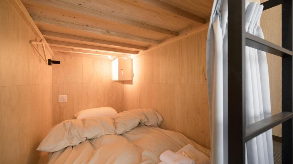 Postel nebo postele na pokoji v ubytování Yutorelo Nikko
