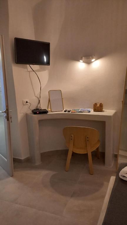 TV a/nebo společenská místnost v ubytování Cueva House