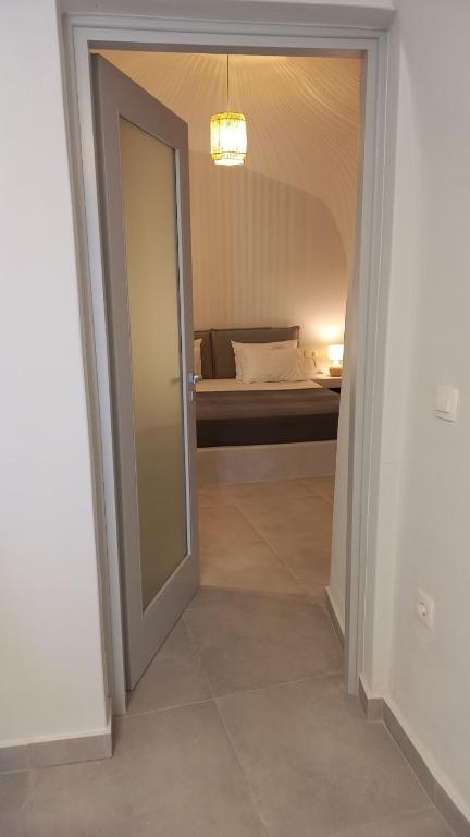 Postel nebo postele na pokoji v ubytování Cueva House