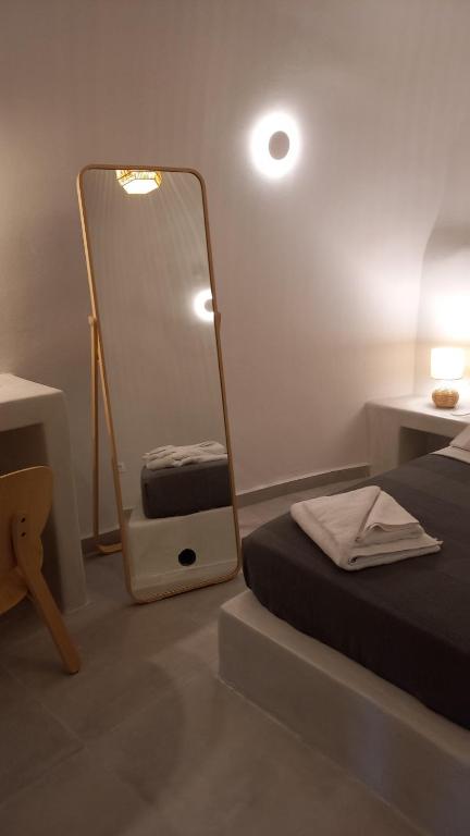 Postel nebo postele na pokoji v ubytování Cueva House