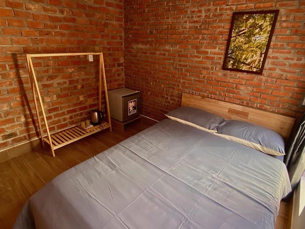 Postel nebo postele na pokoji v ubytování IKIGAI Dorm Hostel - Danang Beach