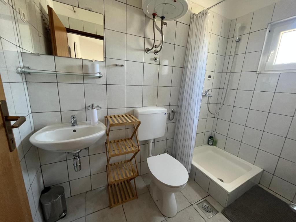 Łazienka w obiekcie Apartments Fortuna
