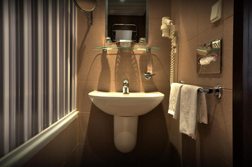Koupelna v ubytování Hotel Olympik