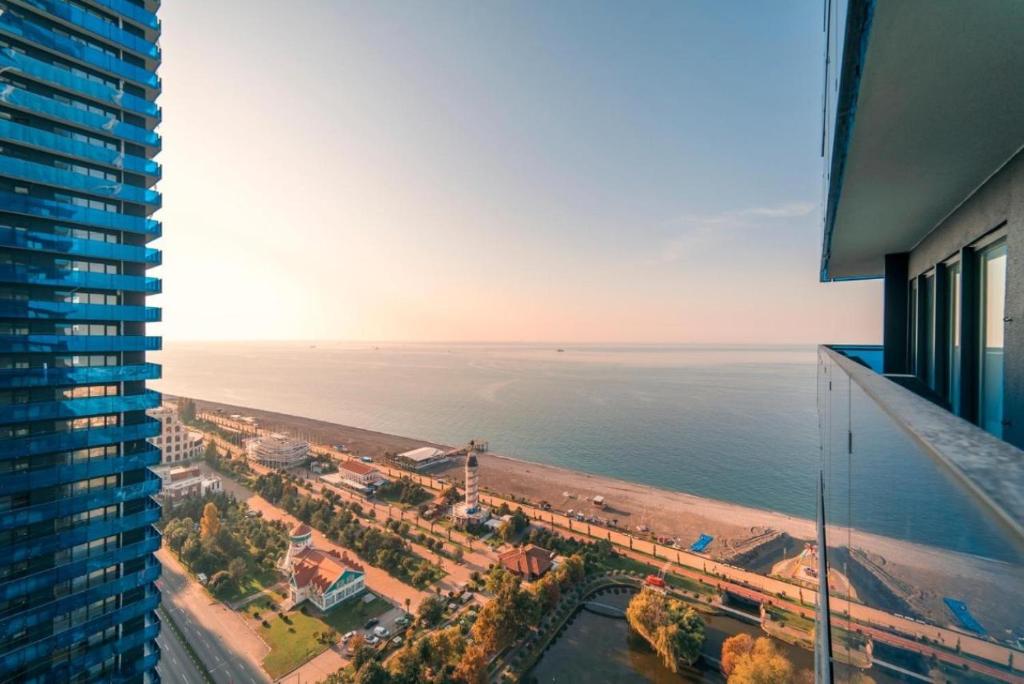 a view of the ocean from a building at Orbi City Black Sea view in Batumi