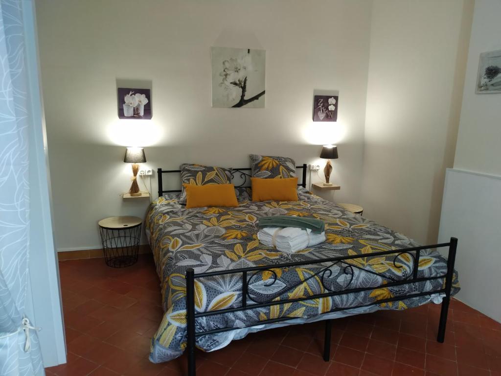 Posteľ alebo postele v izbe v ubytovaní chambre d'hôtes de Lamy 1