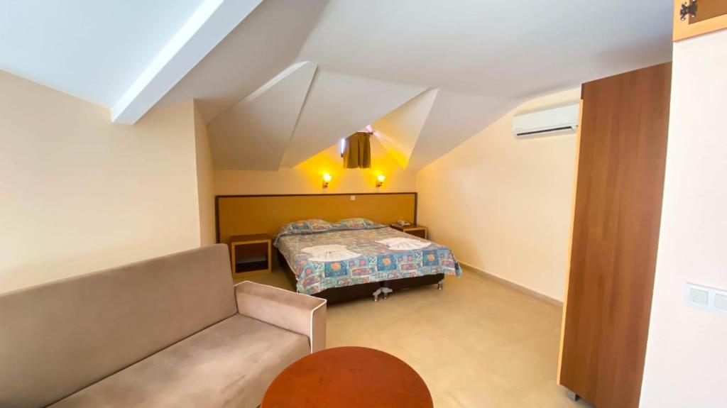 Postel nebo postele na pokoji v ubytování Felice Hotel