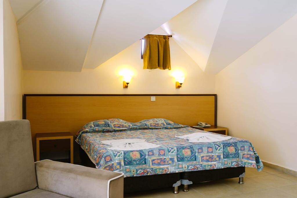 Postel nebo postele na pokoji v ubytování Felice Hotel