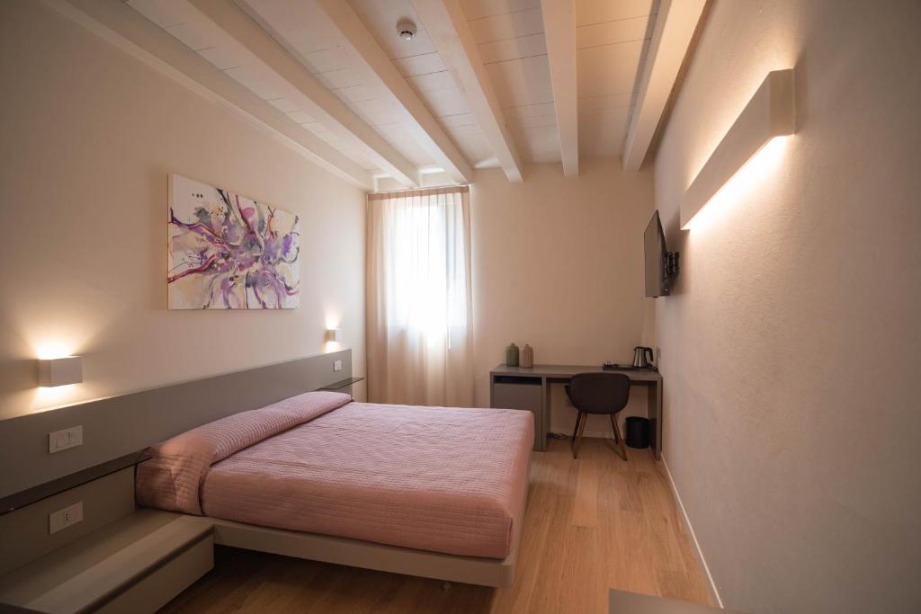 Postel nebo postele na pokoji v ubytování Maison Calcirelli rooms
