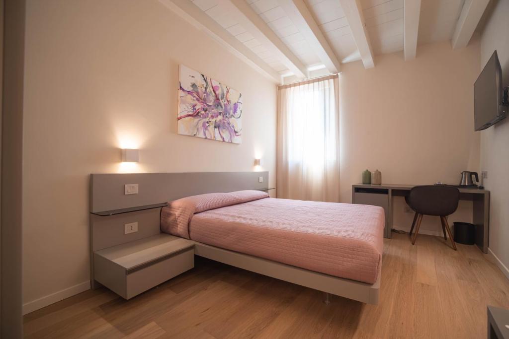 Postel nebo postele na pokoji v ubytování Maison Calcirelli rooms